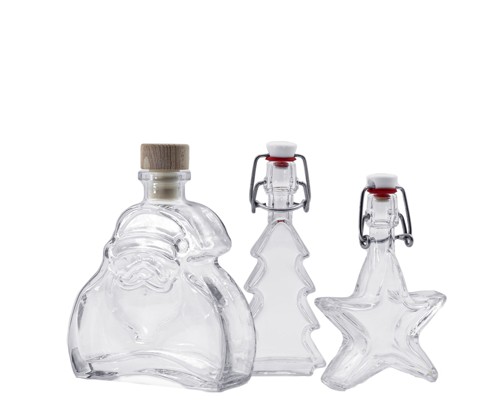 Botellas navideñas Tres botellas decorativas para la temporada navideña.