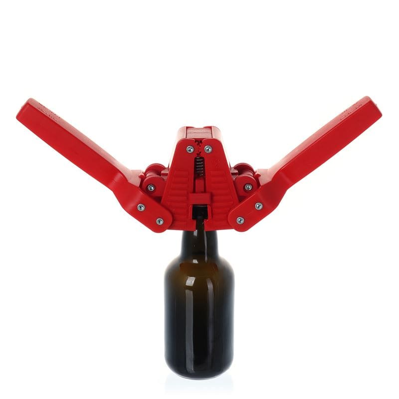 Dispositivo de cierre para tapones corona de 26 mm